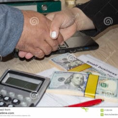 sba application and two people shaking hands