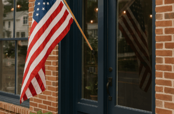 flag in a bank door for Patriot Day
