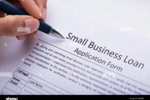 thanks to ar.inspiredpencil.com for photo of a hand filling out a Amall Business Loan application