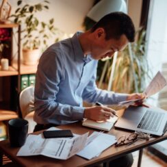 small business owner reviewing financial documents showing fast financing dependence